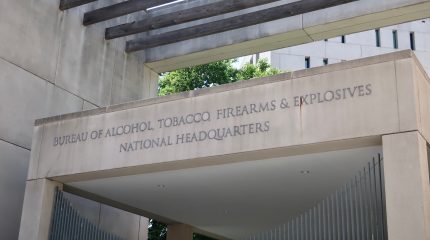 Cement building with Bureau of Alcohol, Tobacco, Firearms and Explosives sign